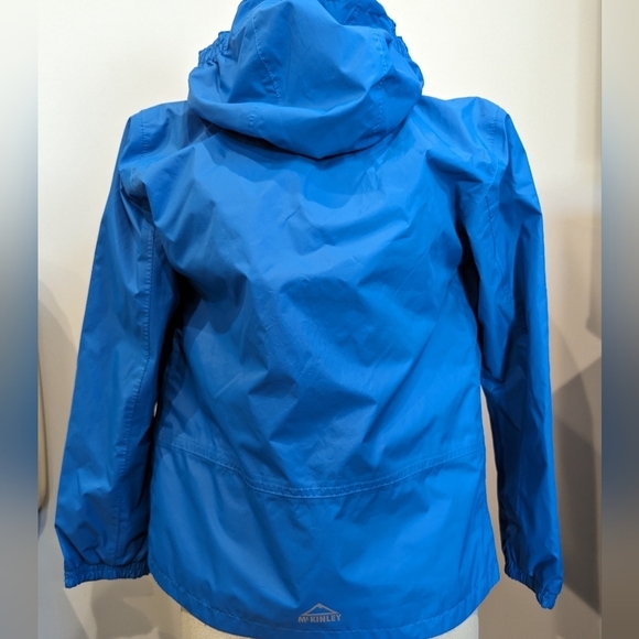 McKinley Castellic junior rain jacket, blue size Medium youth - Picture 5 of 9